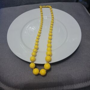 Yellow and goldtone beaded necklace